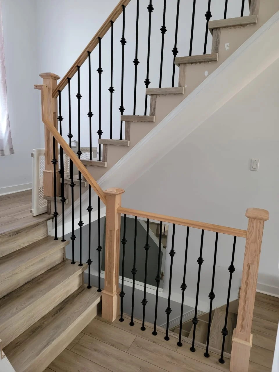 Staircase and landing railing
